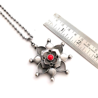 Silver Zenith: Silver Toned Coral Stone Pendant and Earring Set