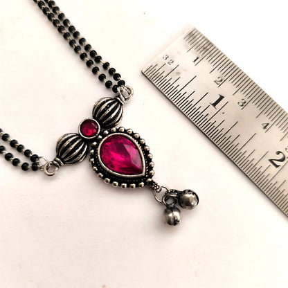 Ishya: Majenta Srone Double Layered Chain Pendant and Earring set