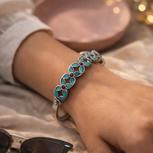 Aqua Veda: Aqua and Ruby Stone Studded Screw Bangle