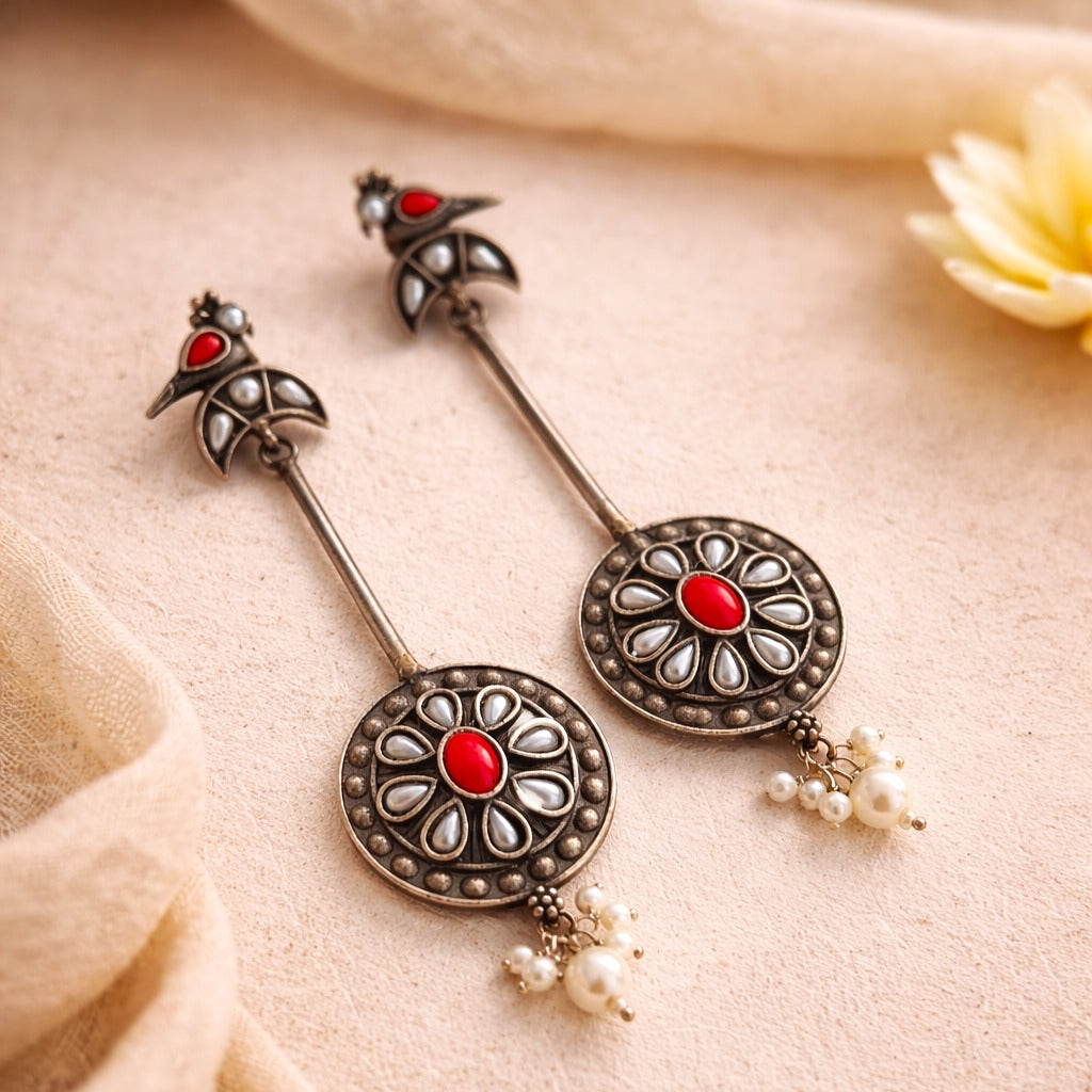Pearl Pendulum: Silver Toned Pear Danglers