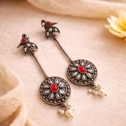 Pearl Pendulum: Silver Toned Pear Danglers