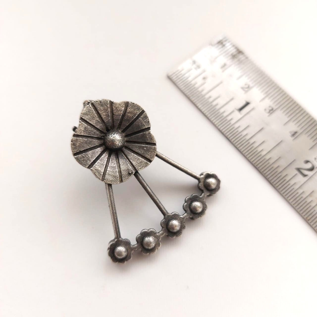 Floral Arc: Floral Silver toned Earrings