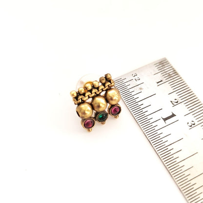 Tavisha: Antique Gold Toned Stone Studded Necklace and Earring Set