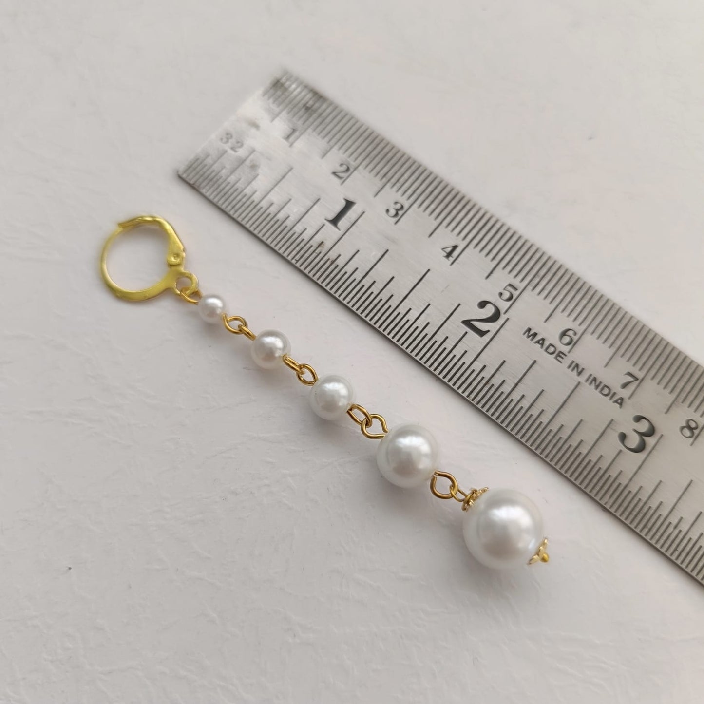 Dewdrop Cascade: Handcrafted Gold Toned Pearl Earring