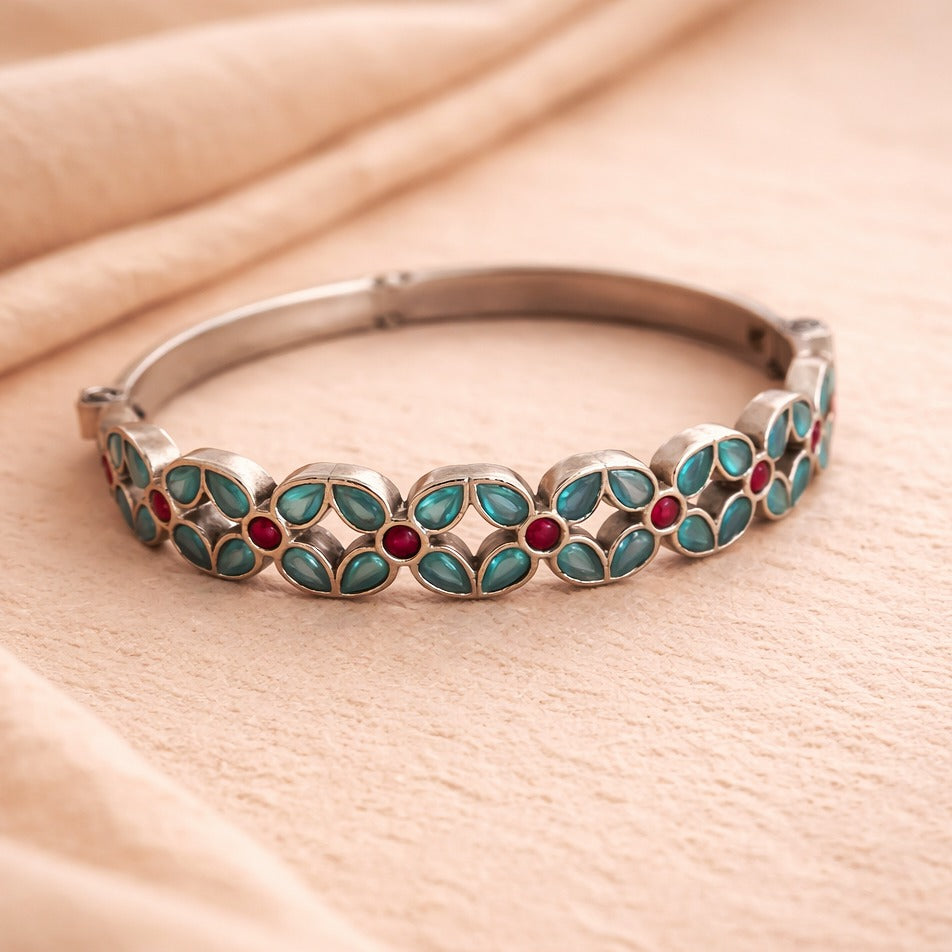 Aqua Veda: Aqua and Ruby Stone Studded Screw Bangle