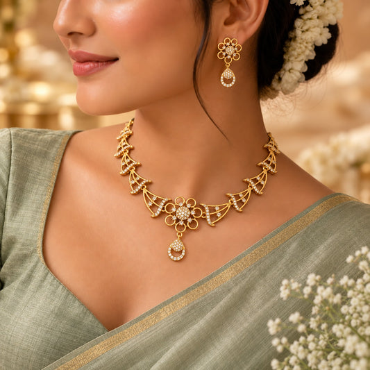 Mihira: Gold-Toned Floral & Fan Motif Necklace and Earring Set