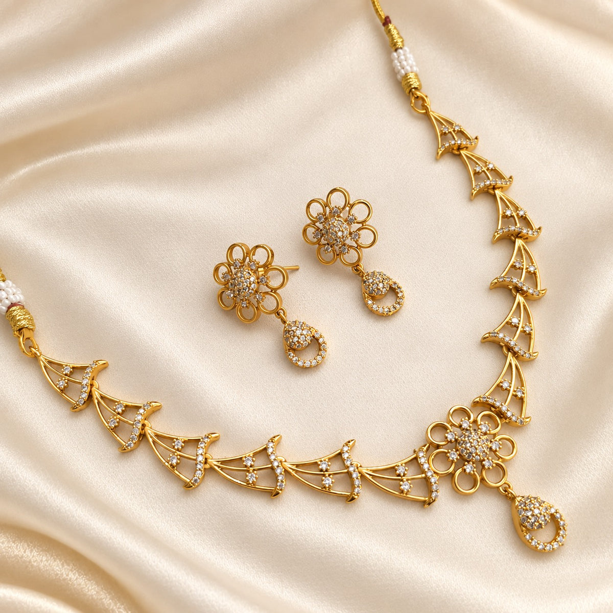 Mihira: Gold-Toned Floral & Fan Motif Necklace and Earring Set