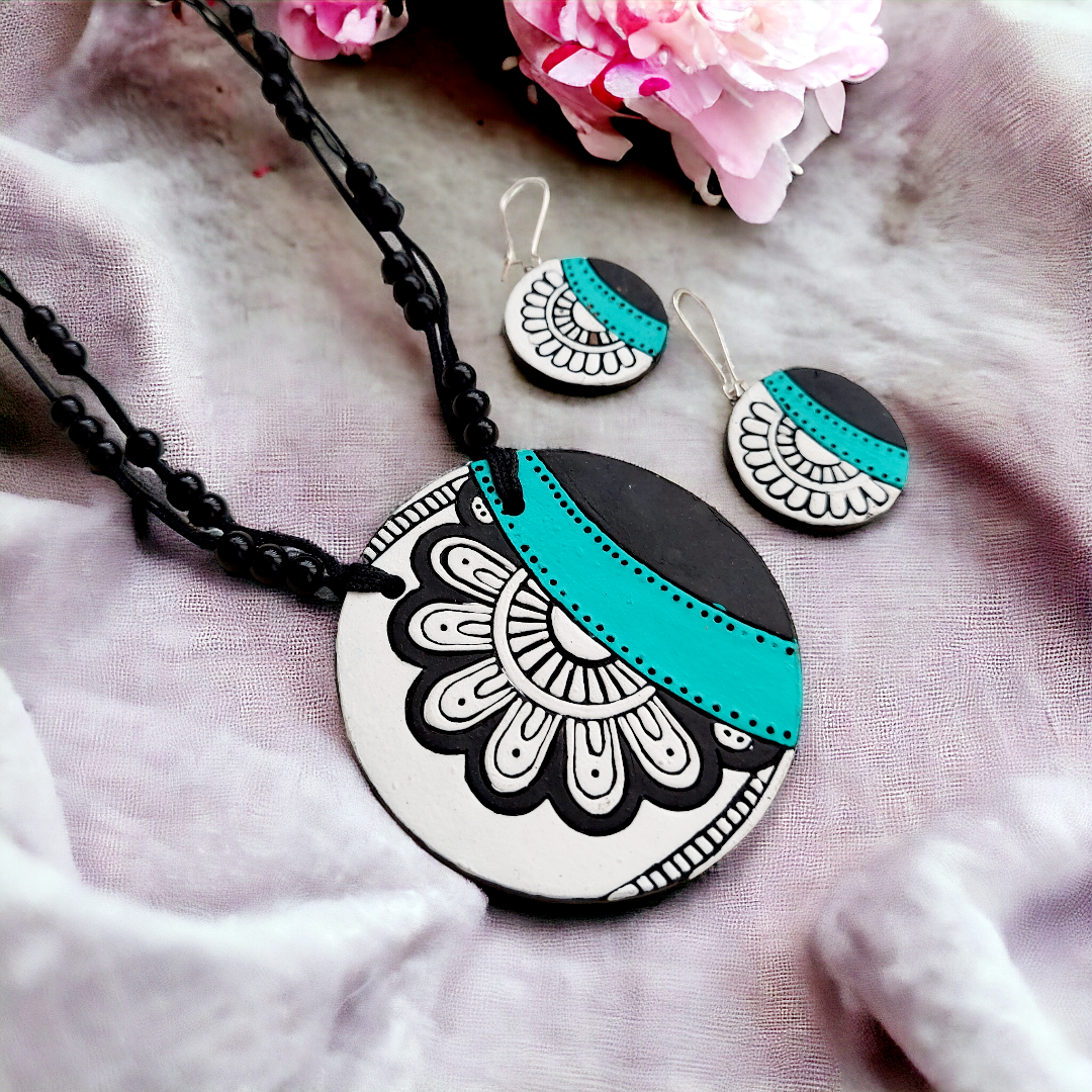 Elegant Contrast: White with Black Floral Design Terracotta Pendant and Matching Earrings Se