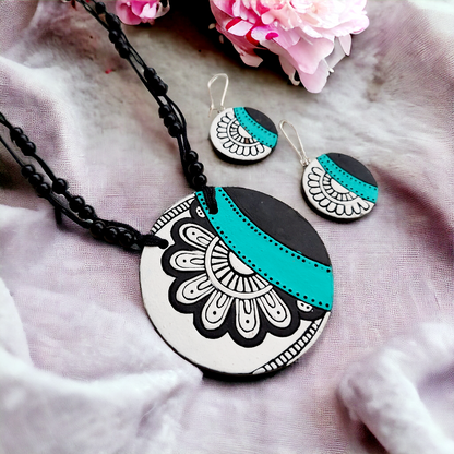 Elegant Contrast: White with Black Floral Design Terracotta Pendant and Matching Earrings Set