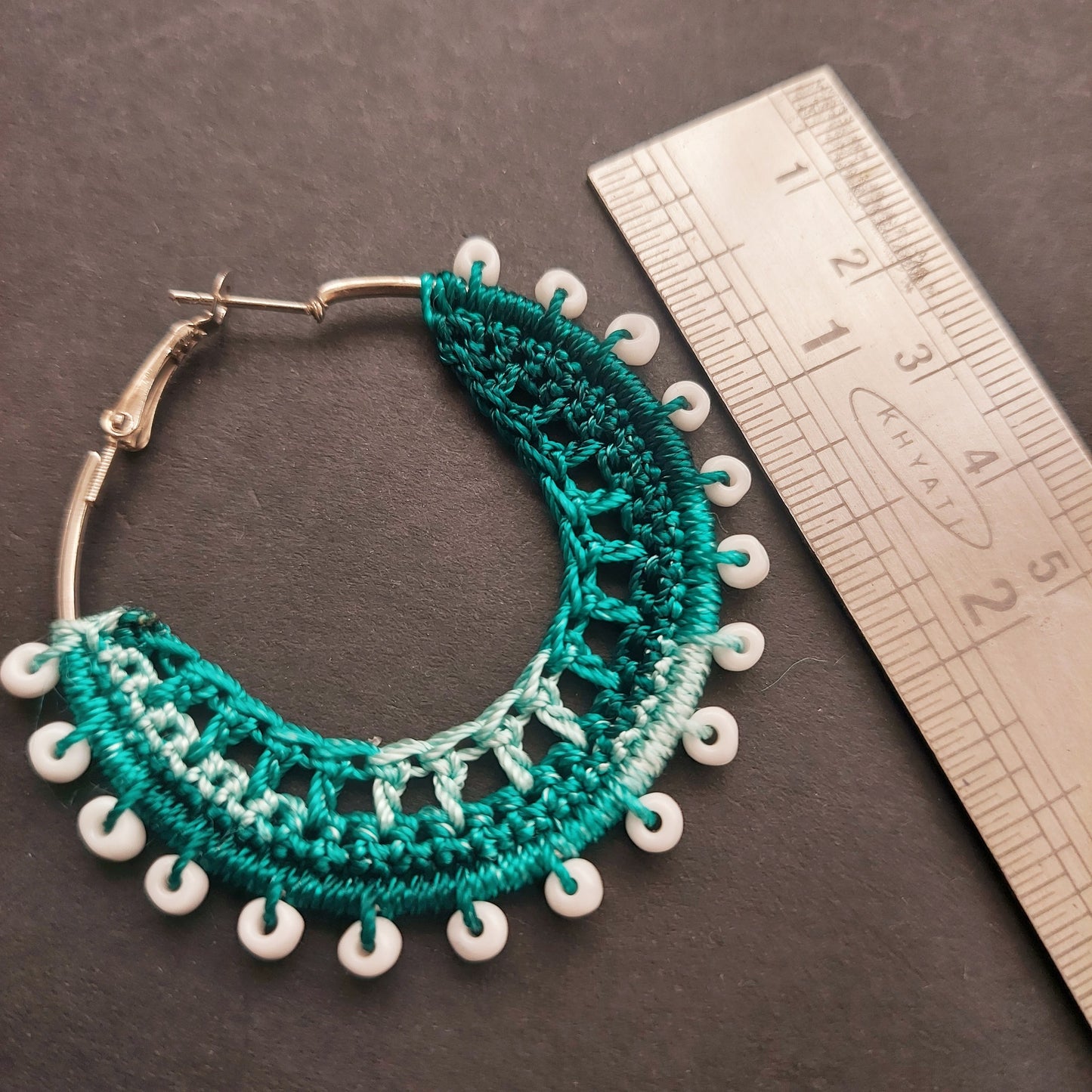 Handcrafted Teal Green White hued Crochet Earrings