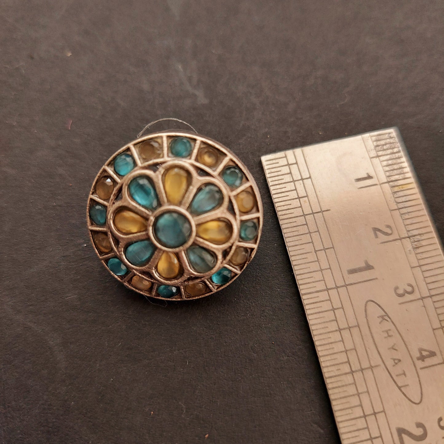 Stone Studded Silver Look alike Round Studs - Light Blue and Light Yellow
