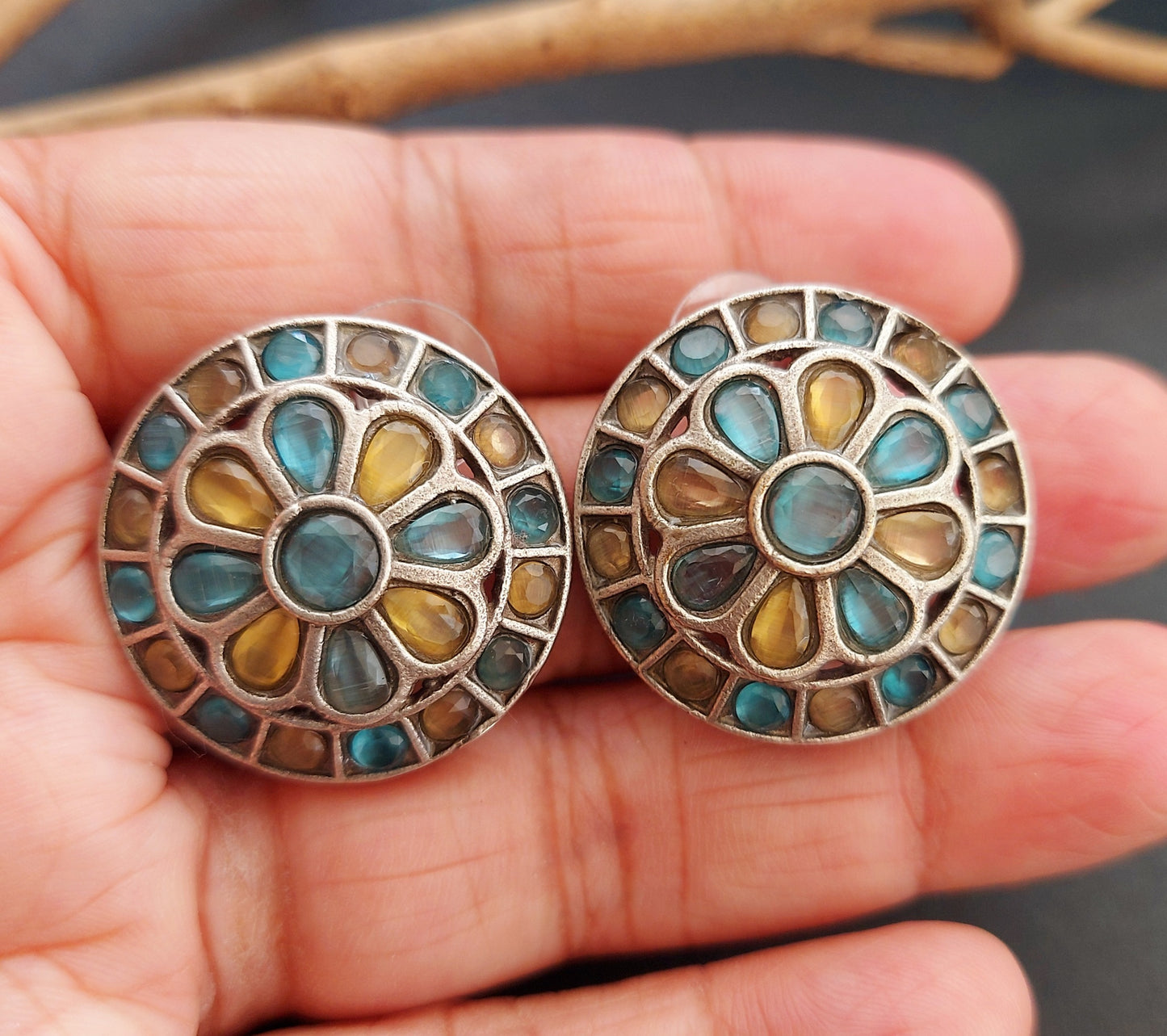 Stone Studded Silver Look alike Round Studs - Light Blue and Light Yellow