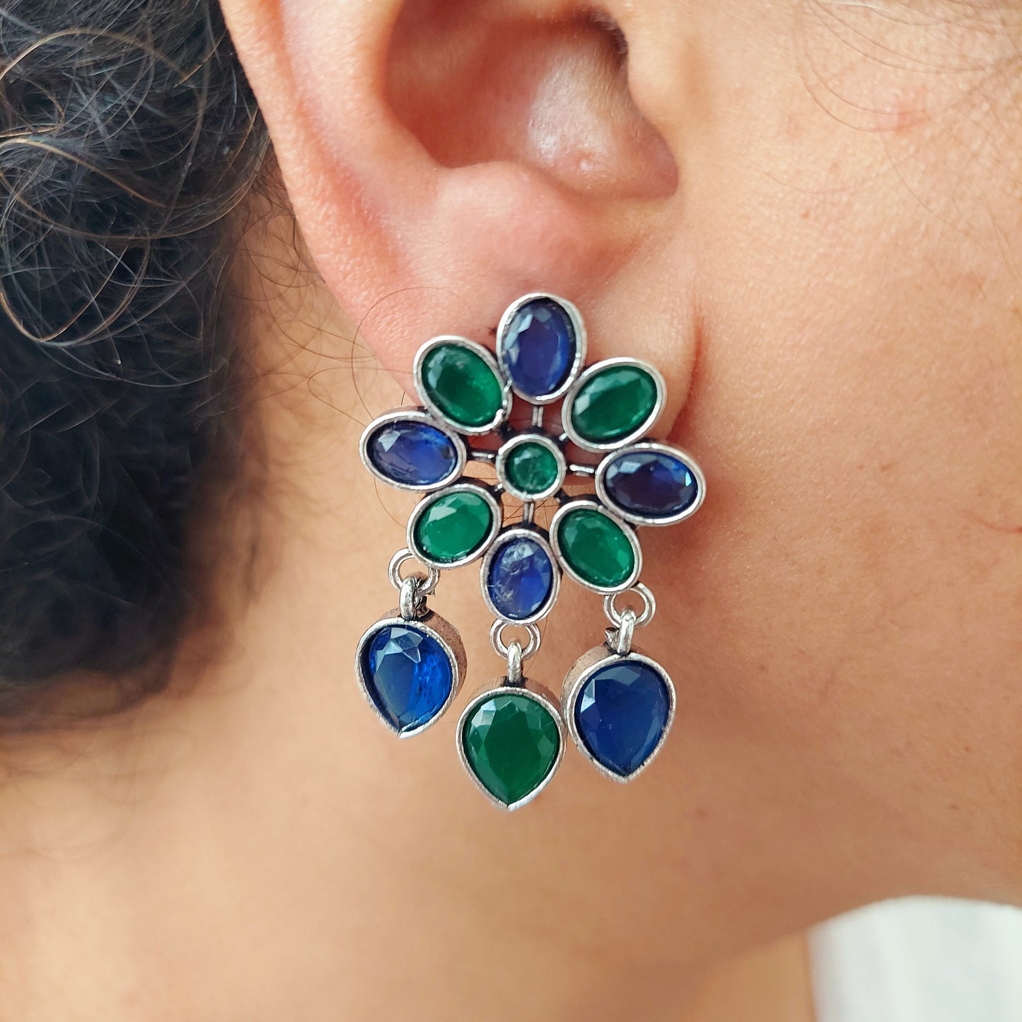 Stone Studded Peacock hued Floral Studs