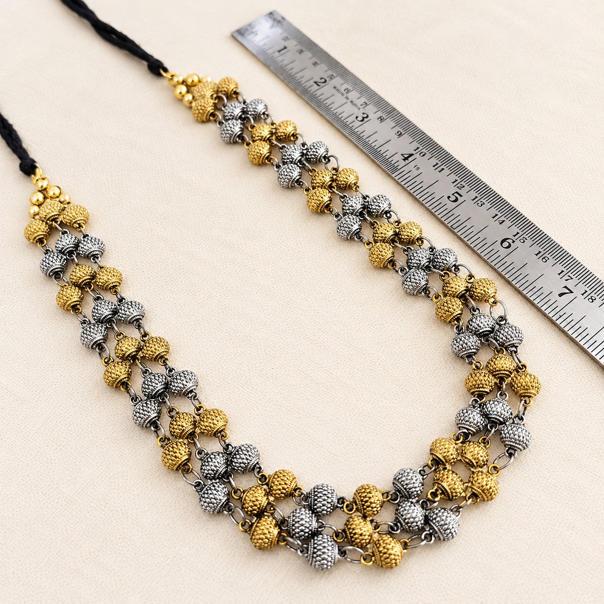 Samyukta: Dual Tone Layered Statement Necklace and Earring Set