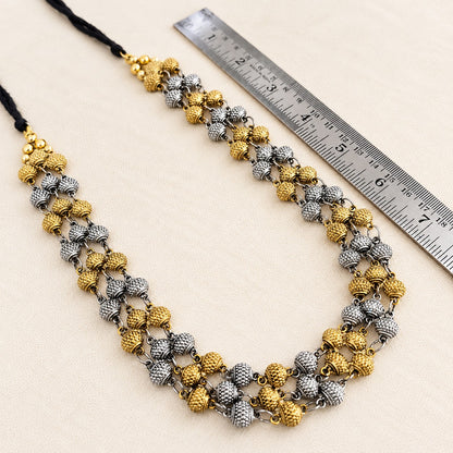 Samyukta: Dual Tone Layered Statement Necklace and Earring Set