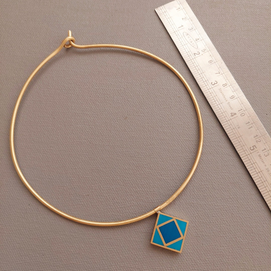 Serene Elegance: Brass Necklace with Double-Toned Blue Pendant