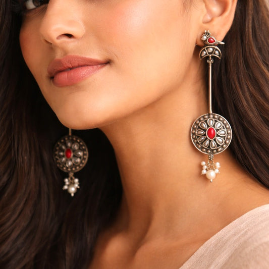 Pearl Pendulum: Silver Toned Pear Danglers